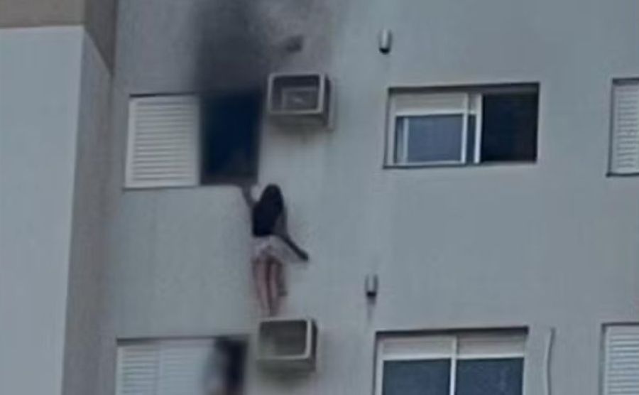 Mulher se pendura em suporte de ar-condicionado para salvar mãe e criança durante incêndio em apartamento no Paraná