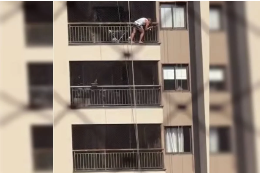 Moradora se arrisca no 13º andar para limpar vidro e é advertida em condomínio no DF